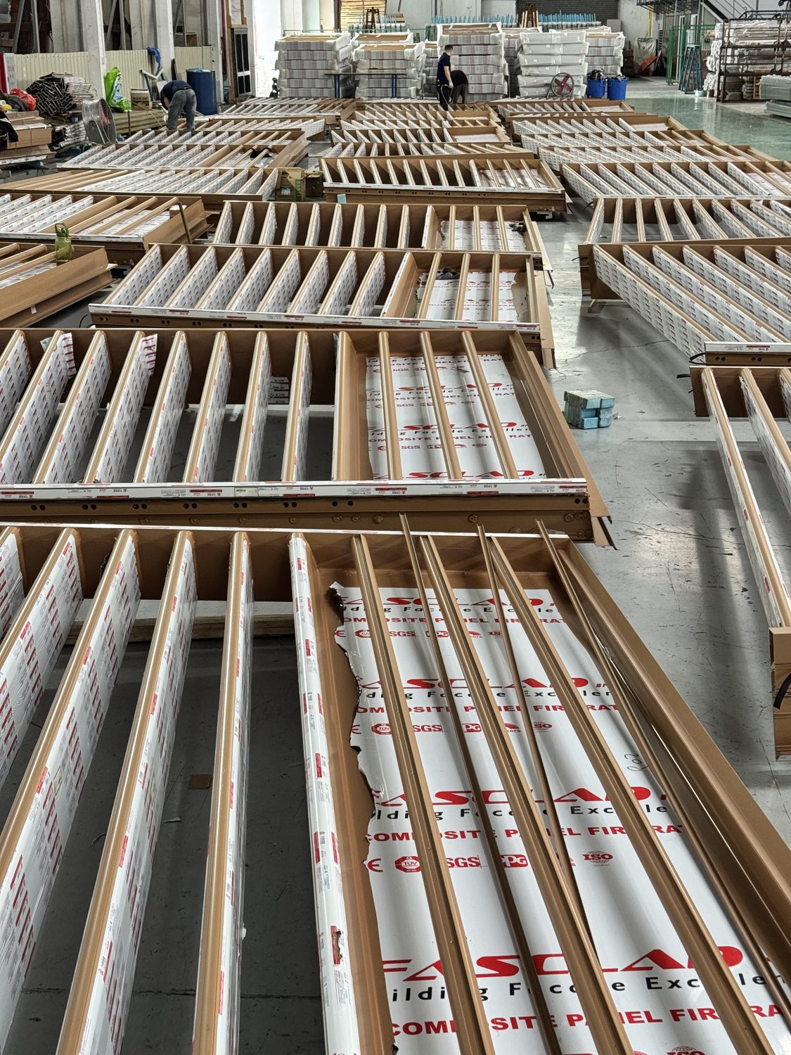 Façade glazing and panel staging